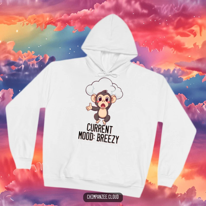 Funny chimpanzee looking surprised as a cloud gently tosses it, featured on a comfortable hoodie for humorous warmth.