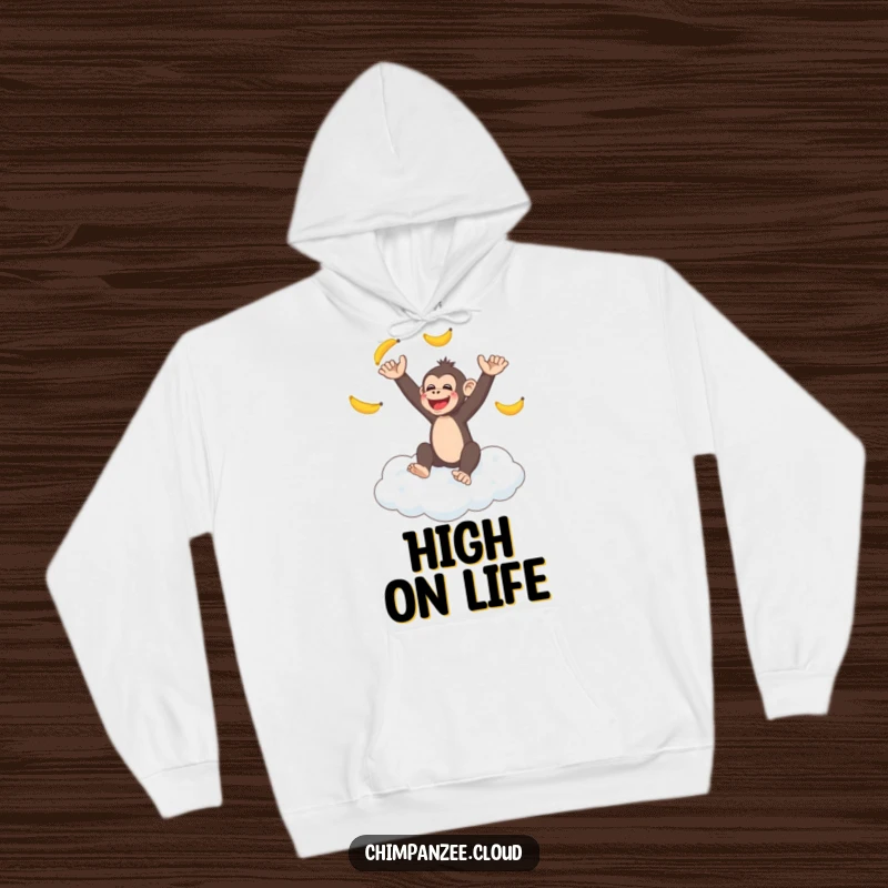 Funny chimpanzee juggling bananas on a fluffy cloud, wearing a cozy hoodie, ideal for a funny animal lover gift.